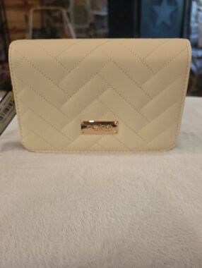 bebe Cream Quilted Wristlet with Gold Logo Plaque